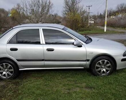 Серый Мицубиси Харизма, объемом двигателя 1.6 л и пробегом 250 тыс. км за 2600 $, фото 4 на Automoto.ua