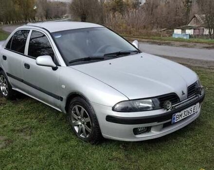 Серый Мицубиси Харизма, объемом двигателя 1.6 л и пробегом 250 тыс. км за 2600 $, фото 5 на Automoto.ua