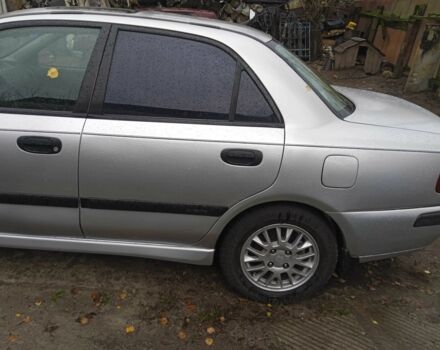 Серый Мицубиси Харизма, объемом двигателя 1.8 л и пробегом 224 тыс. км за 3600 $, фото 9 на Automoto.ua