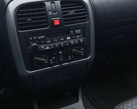 Серый Мицубиси Харизма, объемом двигателя 1.8 л и пробегом 265 тыс. км за 2850 $, фото 18 на Automoto.ua