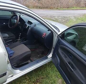 Серый Мицубиси Харизма, объемом двигателя 1.6 л и пробегом 250 тыс. км за 2600 $, фото 13 на Automoto.ua