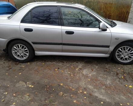 Серый Мицубиси Харизма, объемом двигателя 1.8 л и пробегом 224 тыс. км за 3600 $, фото 13 на Automoto.ua