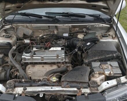 Серый Мицубиси Харизма, объемом двигателя 1.6 л и пробегом 250 тыс. км за 2600 $, фото 18 на Automoto.ua