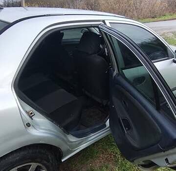 Серый Мицубиси Харизма, объемом двигателя 1.6 л и пробегом 250 тыс. км за 2600 $, фото 14 на Automoto.ua