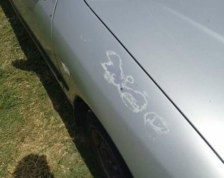 Серый Мицубиси Харизма, объемом двигателя 1.8 л и пробегом 416 тыс. км за 2800 $, фото 2 на Automoto.ua