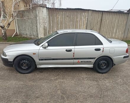 Сірий Міцубісі Харизма, об'ємом двигуна 1.8 л та пробігом 371 тис. км за 2200 $, фото 1 на Automoto.ua