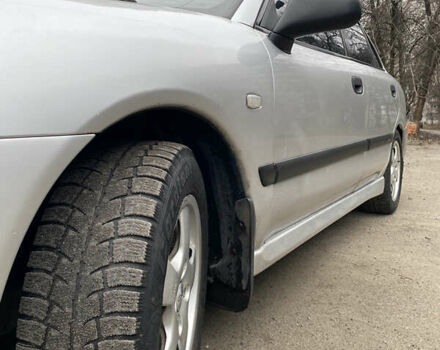 Сірий Міцубісі Харизма, об'ємом двигуна 1.83 л та пробігом 265 тис. км за 2850 $, фото 10 на Automoto.ua