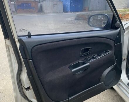 Серый Мицубиси Харизма, объемом двигателя 1.8 л и пробегом 265 тыс. км за 2850 $, фото 14 на Automoto.ua