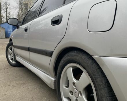 Серый Мицубиси Харизма, объемом двигателя 1.8 л и пробегом 265 тыс. км за 2850 $, фото 7 на Automoto.ua