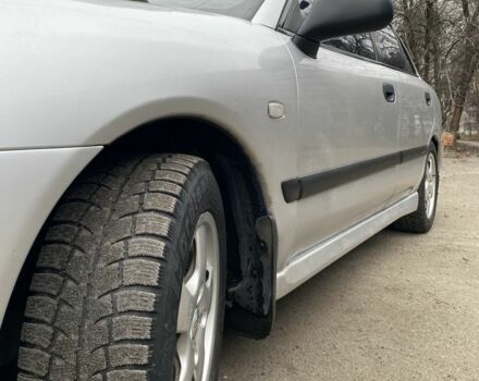 Серый Мицубиси Харизма, объемом двигателя 1.8 л и пробегом 265 тыс. км за 2850 $, фото 10 на Automoto.ua