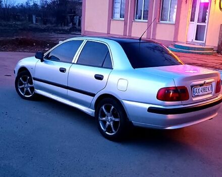 Серый Мицубиси Харизма, объемом двигателя 1.6 л и пробегом 0 тыс. км за 3500 $, фото 3 на Automoto.ua