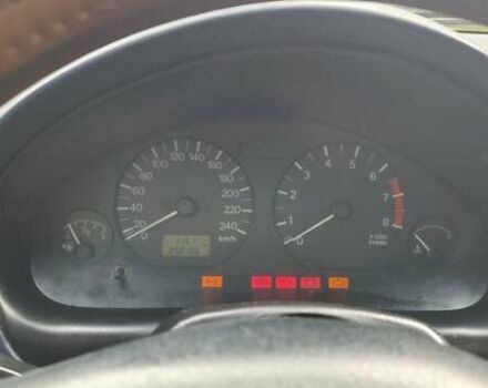 Серый Мицубиси Харизма, объемом двигателя 1.6 л и пробегом 250 тыс. км за 2600 $, фото 1 на Automoto.ua