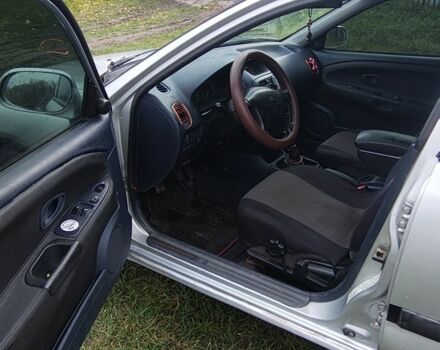 Серый Мицубиси Харизма, объемом двигателя 1.6 л и пробегом 250 тыс. км за 2600 $, фото 14 на Automoto.ua