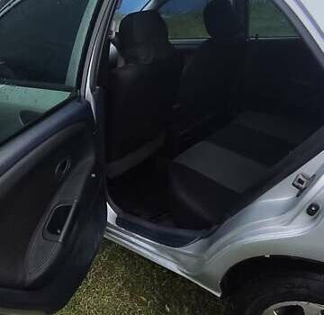 Серый Мицубиси Харизма, объемом двигателя 1.6 л и пробегом 250 тыс. км за 2600 $, фото 15 на Automoto.ua