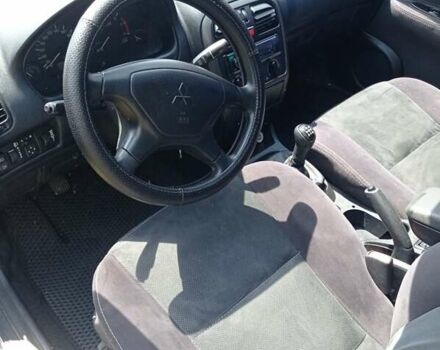 Серый Мицубиси Харизма, объемом двигателя 1.8 л и пробегом 416 тыс. км за 2800 $, фото 9 на Automoto.ua