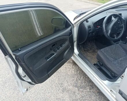 Сірий Міцубісі Харизма, об'ємом двигуна 1.8 л та пробігом 371 тис. км за 2200 $, фото 4 на Automoto.ua