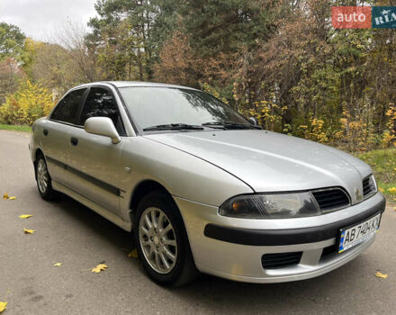 Серый Мицубиси Харизма, объемом двигателя 1.6 л и пробегом 178 тыс. км за 3200 $, фото 2 на Automoto.ua