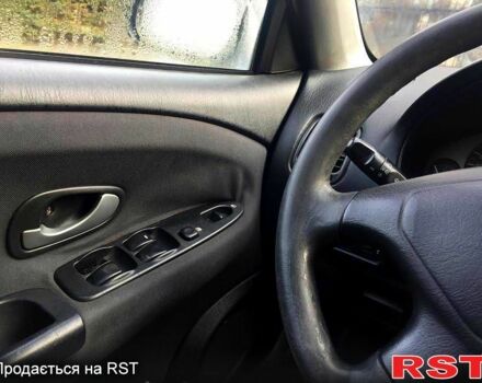 Серый Мицубиси Харизма, объемом двигателя 1.6 л и пробегом 310 тыс. км за 2150 $, фото 6 на Automoto.ua