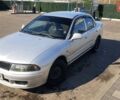 Сірий Міцубісі Харизма, об'ємом двигуна 1.6 л та пробігом 340 тис. км за 2099 $, фото 1 на Automoto.ua