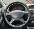 Серый Мицубиси Харизма, объемом двигателя 1.83 л и пробегом 326 тыс. км за 3400 $, фото 12 на Automoto.ua