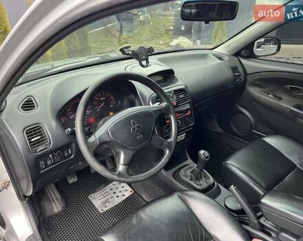 Серый Мицубиси Харизма, объемом двигателя 1.83 л и пробегом 326 тыс. км за 3400 $, фото 10 на Automoto.ua