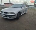 Серый Мицубиси Харизма, объемом двигателя 1.6 л и пробегом 435 тыс. км за 3500 $, фото 1 на Automoto.ua