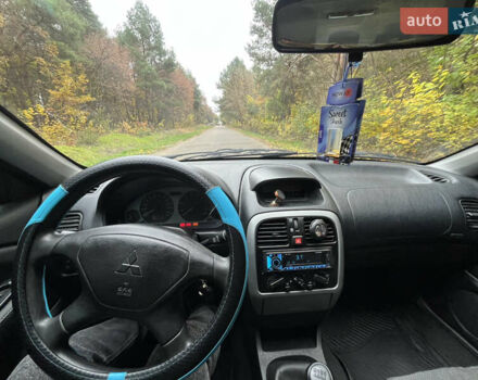 Серый Мицубиси Харизма, объемом двигателя 1.6 л и пробегом 178 тыс. км за 3200 $, фото 10 на Automoto.ua