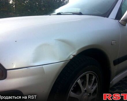 Серый Мицубиси Харизма, объемом двигателя 1.6 л и пробегом 310 тыс. км за 2150 $, фото 3 на Automoto.ua