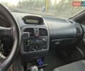 Сірий Міцубісі Харизма, об'ємом двигуна 1.6 л та пробігом 338 тис. км за 2400 $, фото 6 на Automoto.ua
