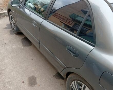 Сірий Міцубісі Харизма, об'ємом двигуна 1.6 л та пробігом 3 тис. км за 2000 $, фото 1 на Automoto.ua