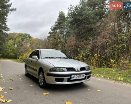 Серый Мицубиси Харизма, объемом двигателя 1.6 л и пробегом 178 тыс. км за 3200 $, фото 1 на Automoto.ua