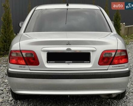 Серый Мицубиси Харизма, объемом двигателя 1.83 л и пробегом 326 тыс. км за 3400 $, фото 3 на Automoto.ua