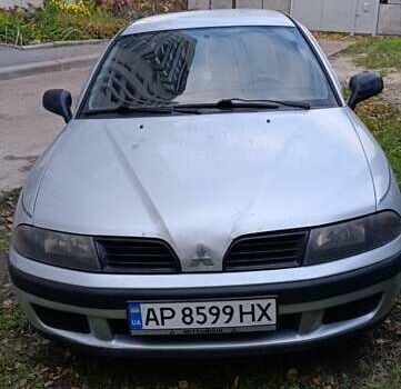 Серый Мицубиси Харизма, объемом двигателя 1.6 л и пробегом 226 тыс. км за 3000 $, фото 2 на Automoto.ua