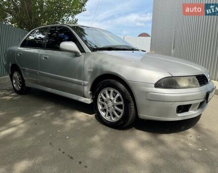 Сірий Міцубісі Харизма, об'ємом двигуна 1.6 л та пробігом 157 тис. км за 5200 $, фото 2 на Automoto.ua