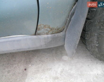 Сірий Міцубісі Харизма, об'ємом двигуна 1.6 л та пробігом 275 тис. км за 2450 $, фото 7 на Automoto.ua