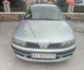 Сірий Міцубісі Харизма, об'ємом двигуна 1.6 л та пробігом 275 тис. км за 2450 $, фото 2 на Automoto.ua