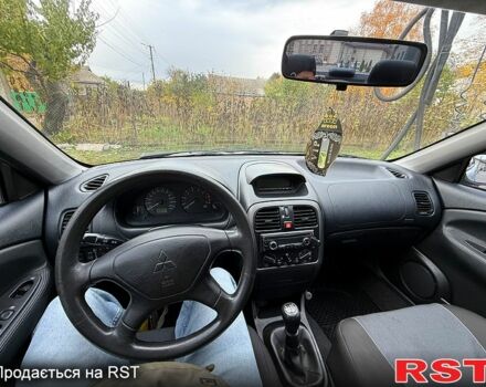 Міцубісі Харизма 2003 у Яготине на Automoto.ua Сірий Міцубісі Харизма, об'ємом двигуна 1.6 л та пробігом 184 тис. км за 3900 $, фото 11 на Automoto.ua