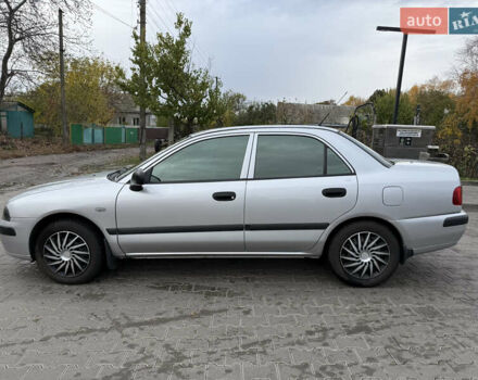 Серый Мицубиси Харизма, объемом двигателя 1.6 л и пробегом 184 тыс. км за 3900 $, фото 5 на Automoto.ua