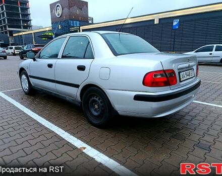 Серый Мицубиси Харизма, объемом двигателя 1.6 л и пробегом 212 тыс. км за 3700 $, фото 5 на Automoto.ua