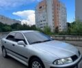 Сірий Міцубісі Харизма, об'ємом двигуна 1.6 л та пробігом 281 тис. км за 2999 $, фото 1 на Automoto.ua