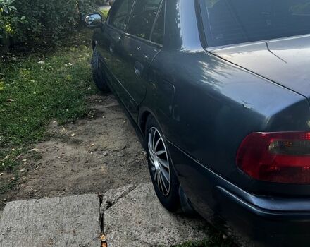 Серый Мицубиси Харизма, объемом двигателя 1.6 л и пробегом 0 тыс. км за 3200 $, фото 6 на Automoto.ua