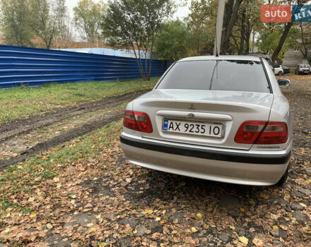 Сірий Міцубісі Харизма, об'ємом двигуна 1.6 л та пробігом 285 тис. км за 3000 $, фото 3 на Automoto.ua