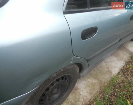 Сірий Міцубісі Харизма, об'ємом двигуна 1.6 л та пробігом 275 тис. км за 2450 $, фото 8 на Automoto.ua