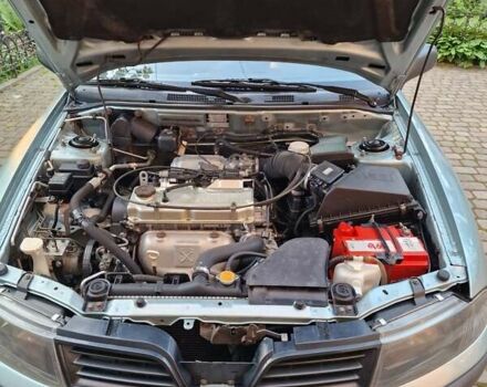 Серый Мицубиси Харизма, объемом двигателя 1.6 л и пробегом 286 тыс. км за 4800 $, фото 9 на Automoto.ua