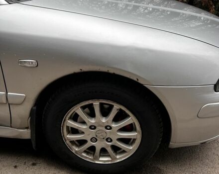 Сірий Міцубісі Харизма, об'ємом двигуна 1.6 л та пробігом 262 тис. км за 3700 $, фото 15 на Automoto.ua