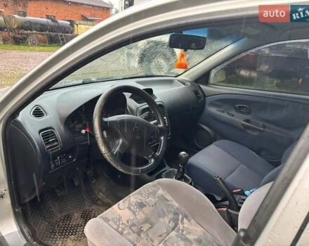 Сірий Міцубісі Харизма, об'ємом двигуна 1.6 л та пробігом 245 тис. км за 1700 $, фото 4 на Automoto.ua