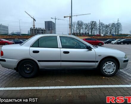 Серый Мицубиси Харизма, объемом двигателя 1.6 л и пробегом 212 тыс. км за 3700 $, фото 8 на Automoto.ua