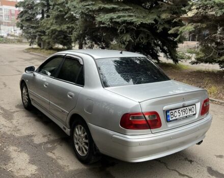 Сірий Міцубісі Харизма, об'ємом двигуна 1.6 л та пробігом 262 тис. км за 3700 $, фото 3 на Automoto.ua