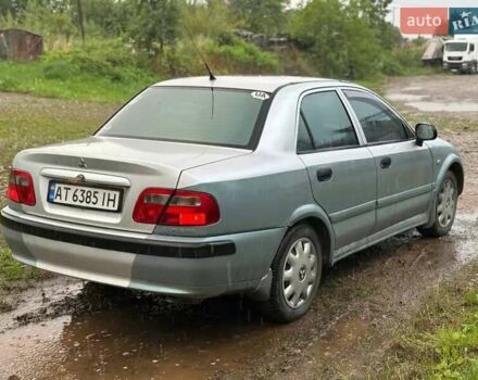 Сірий Міцубісі Харизма, об'ємом двигуна 1.6 л та пробігом 245 тис. км за 1700 $, фото 3 на Automoto.ua