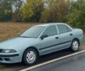 Серый Мицубиси Харизма, объемом двигателя 1.6 л и пробегом 256 тыс. км за 4100 $, фото 1 на Automoto.ua